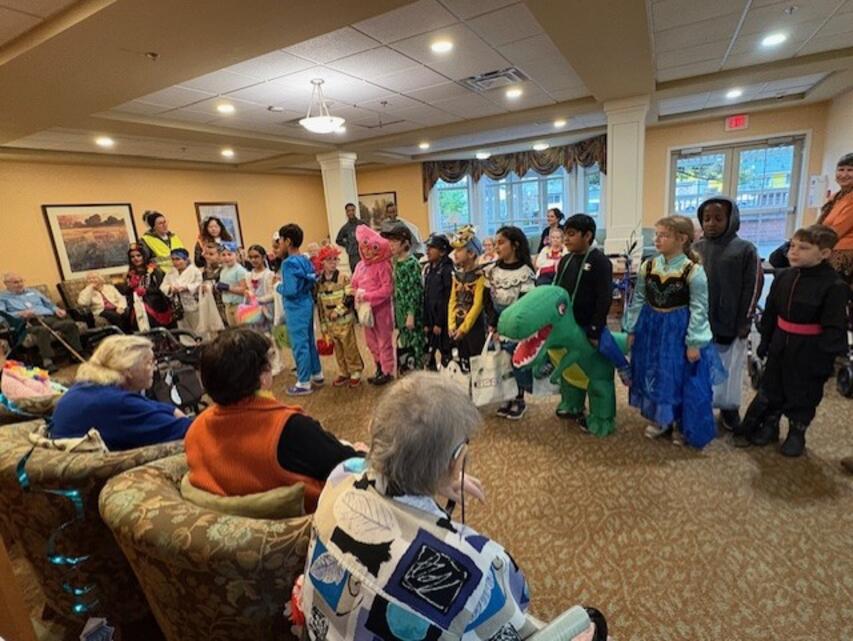 Students visiting residents at Tabor Village Senior Home.